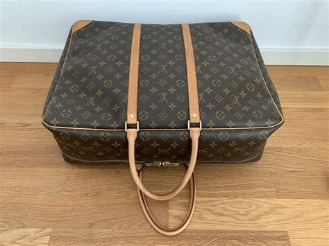 Louis Vuitton Reisetasche und Koffer 